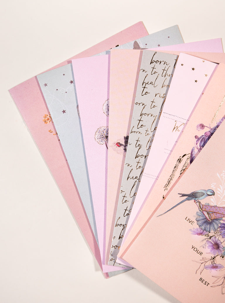 greeting card collage on table