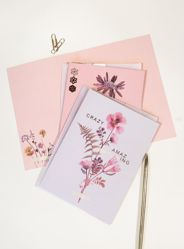 pink flower greeting cards and pen