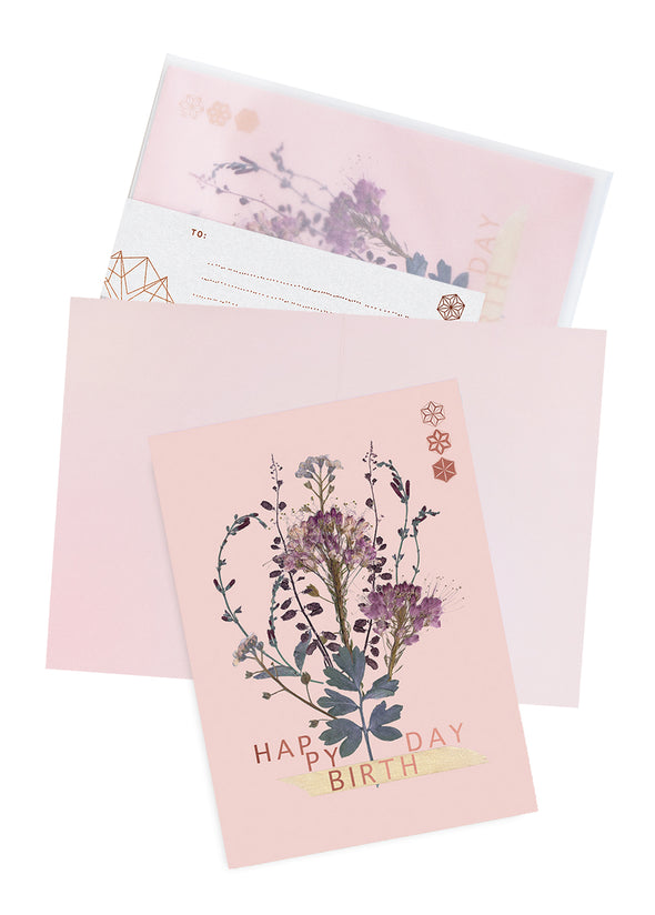 bundle blooms birthday card on table