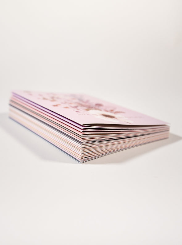 stack of amethyst greeting cards