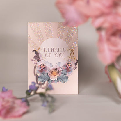 papaya pansy mini greeting card lifestyle shot with florals