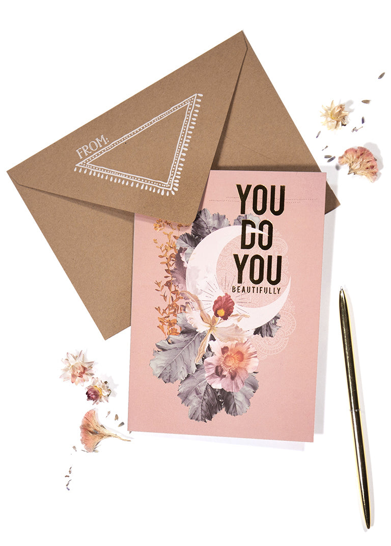 greeting cards with pen on table